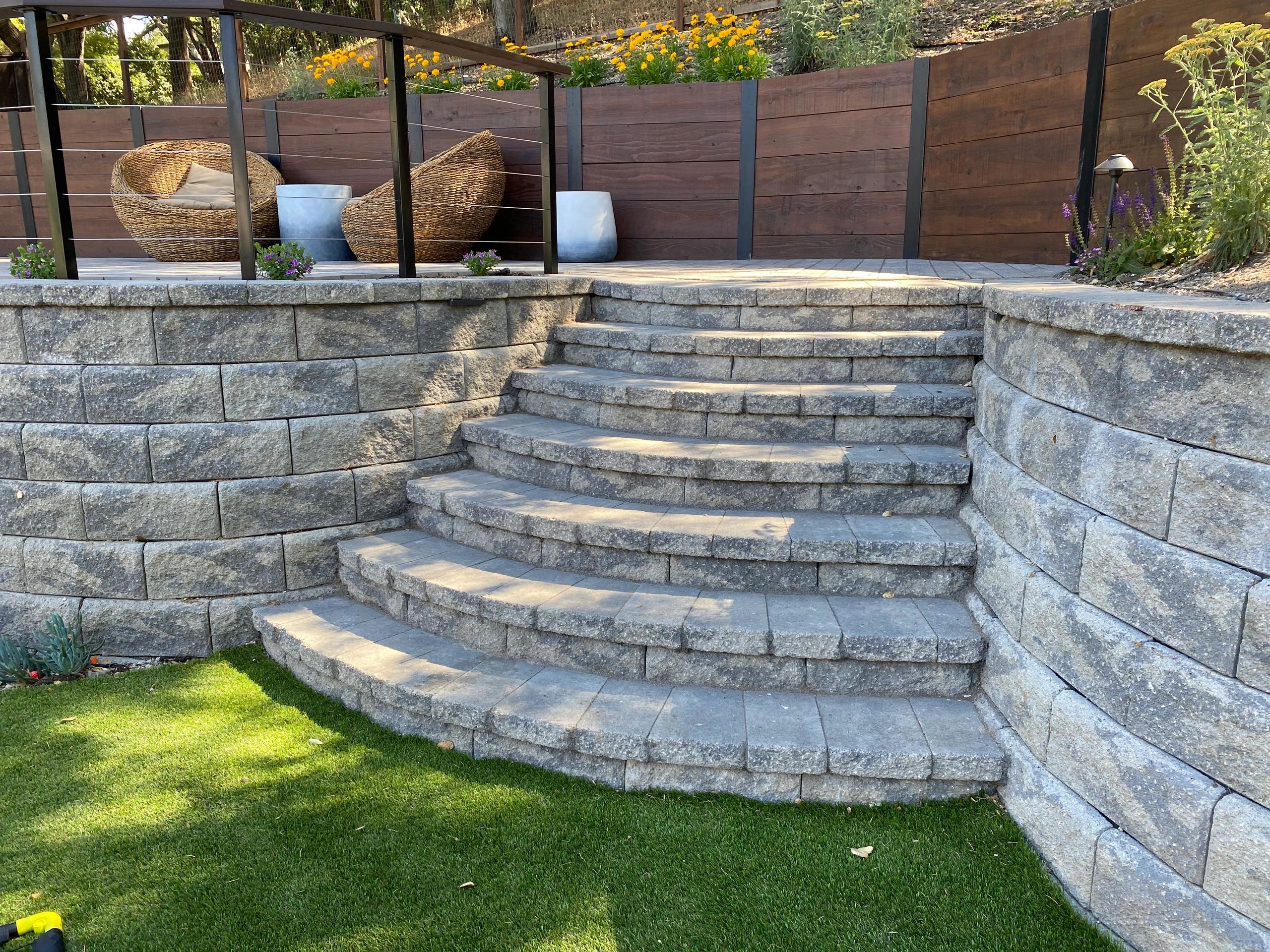Outdoor patio with stone wall steps