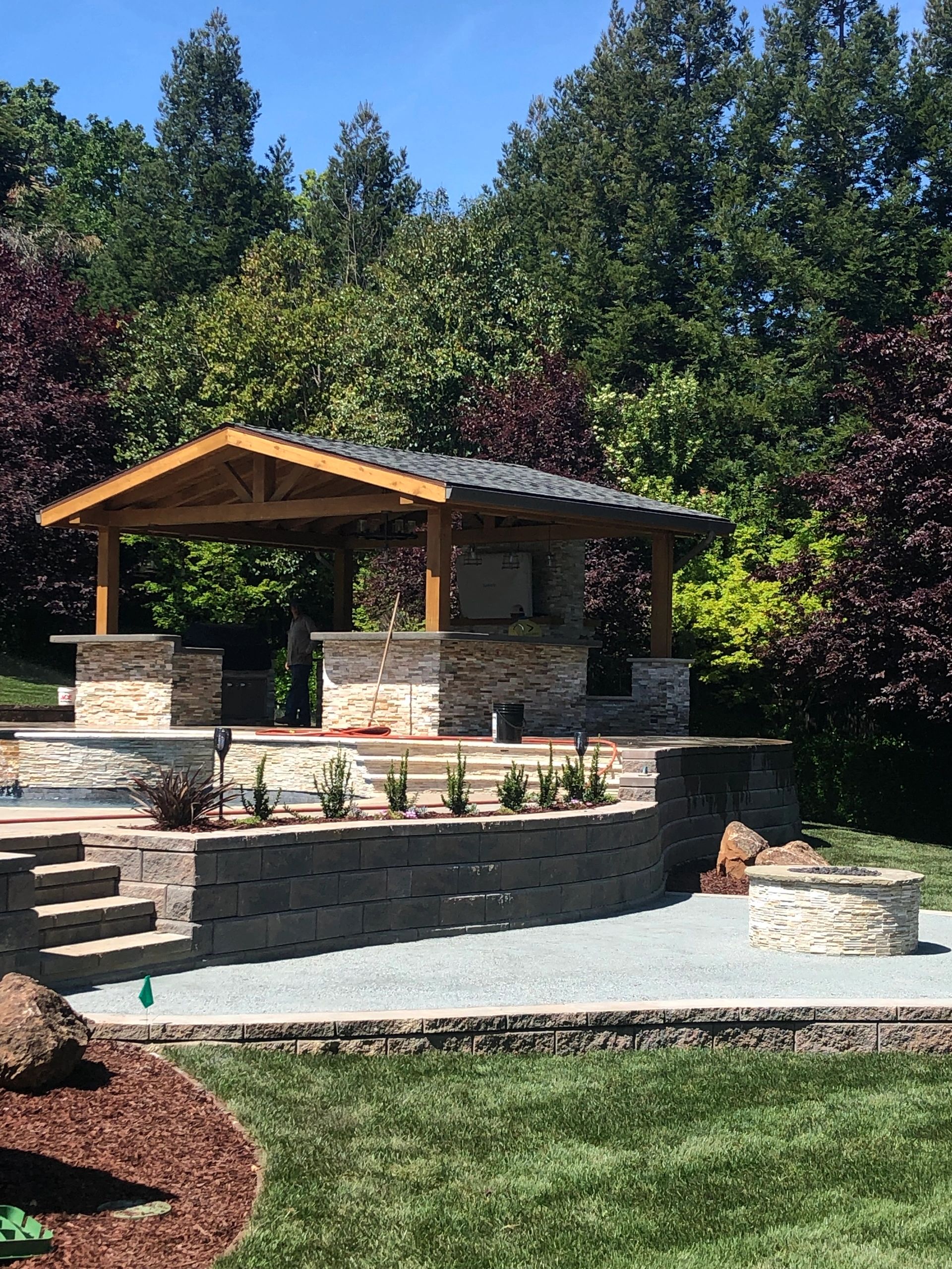 Outdoor kitchen with stone accents