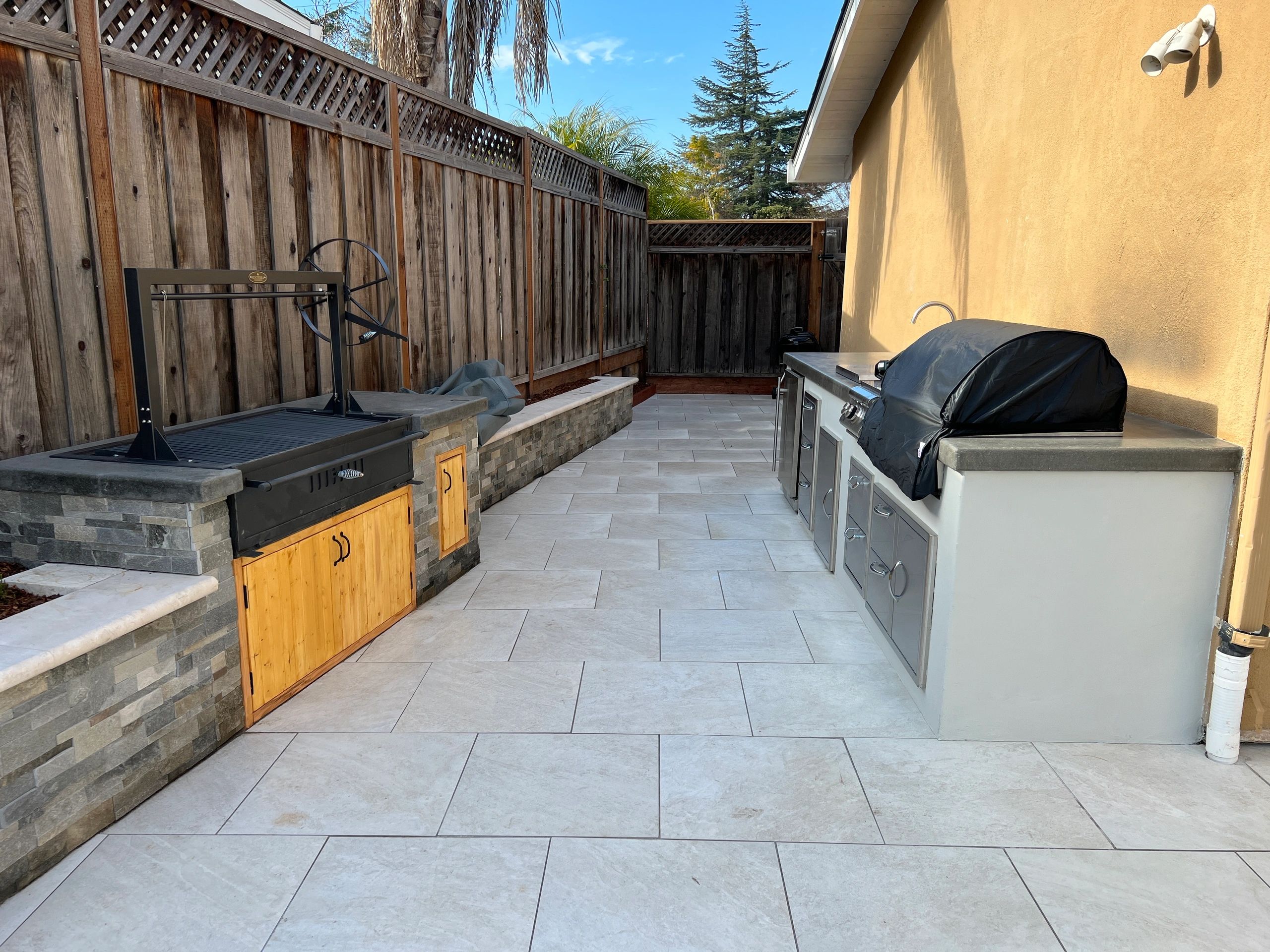 Backyard patio with tiled flooring