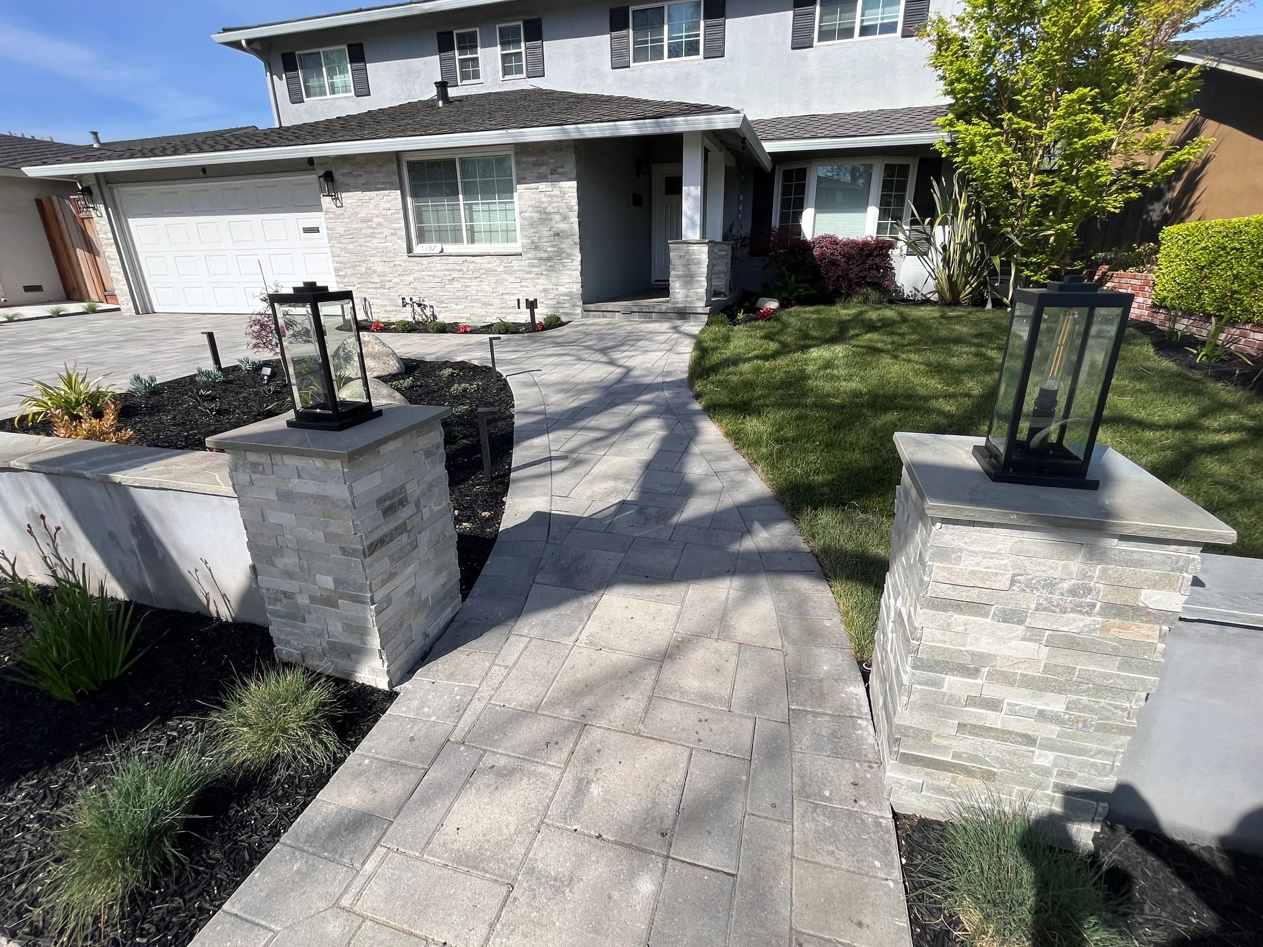 Modern suburban house with paved walkway