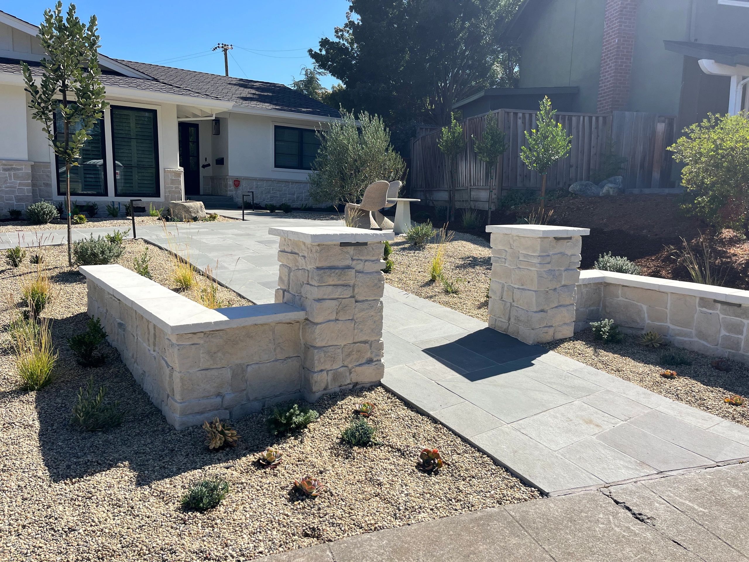 Modern front yard with stone pathway