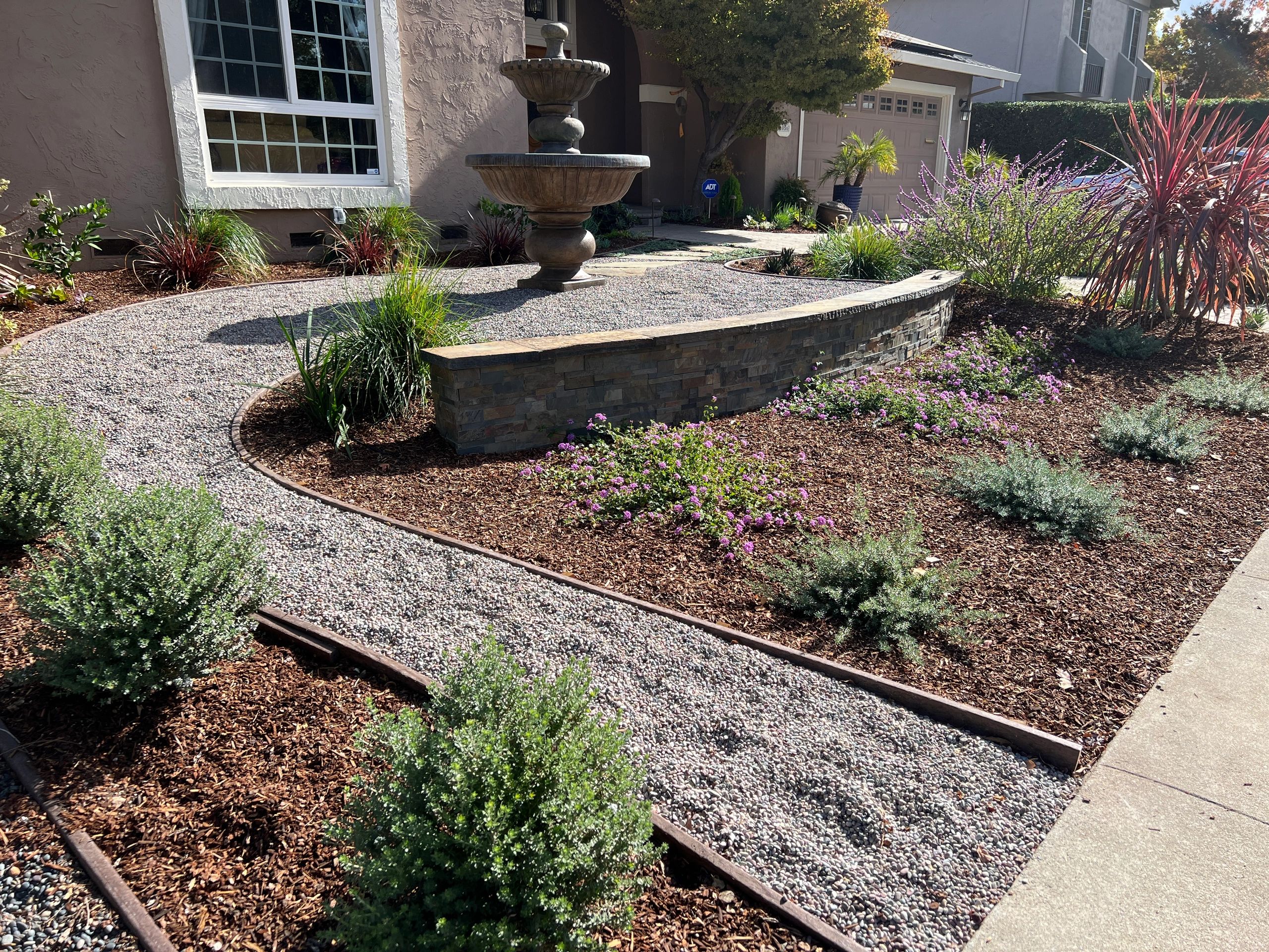 Decorative garden with stone pathway and plants