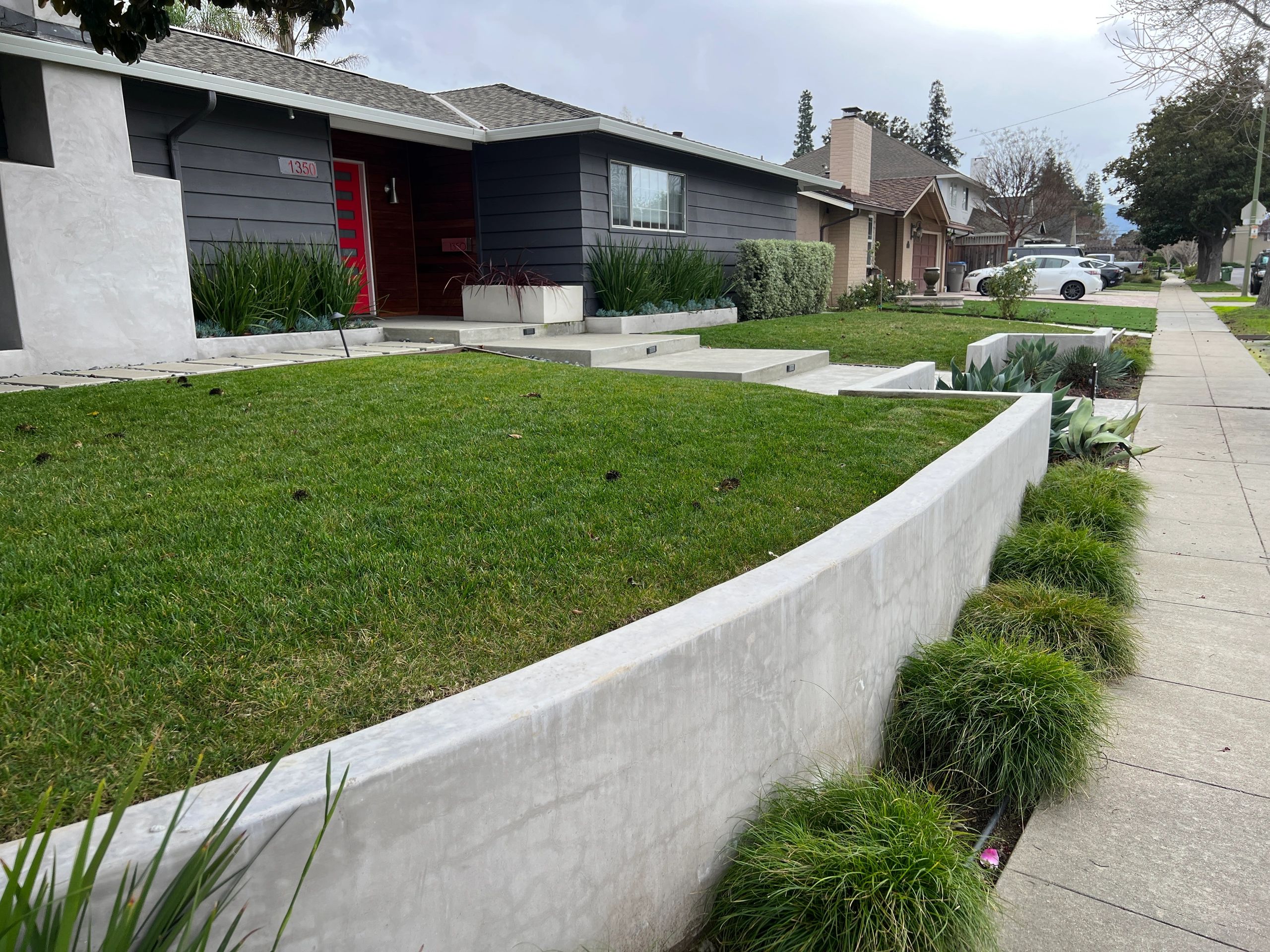 Concrete retaining wall in front yard