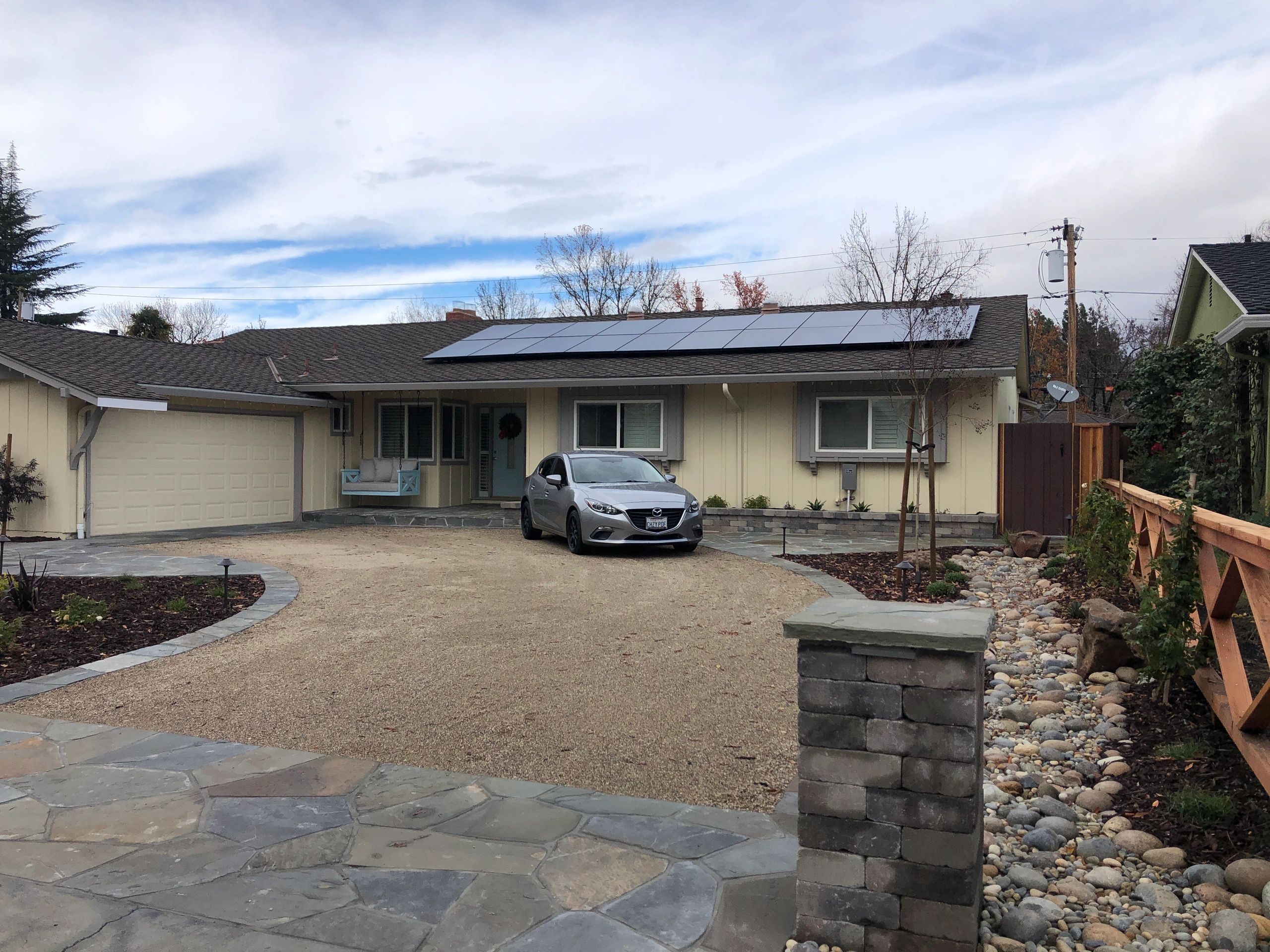 Single-story house with solar panels
