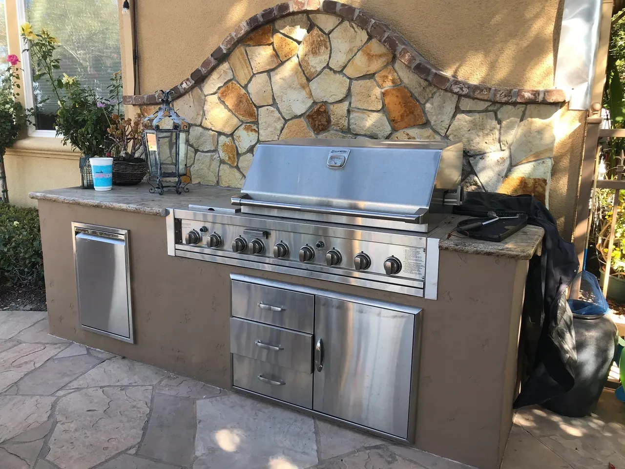 Modern outdoor cooking area with grill