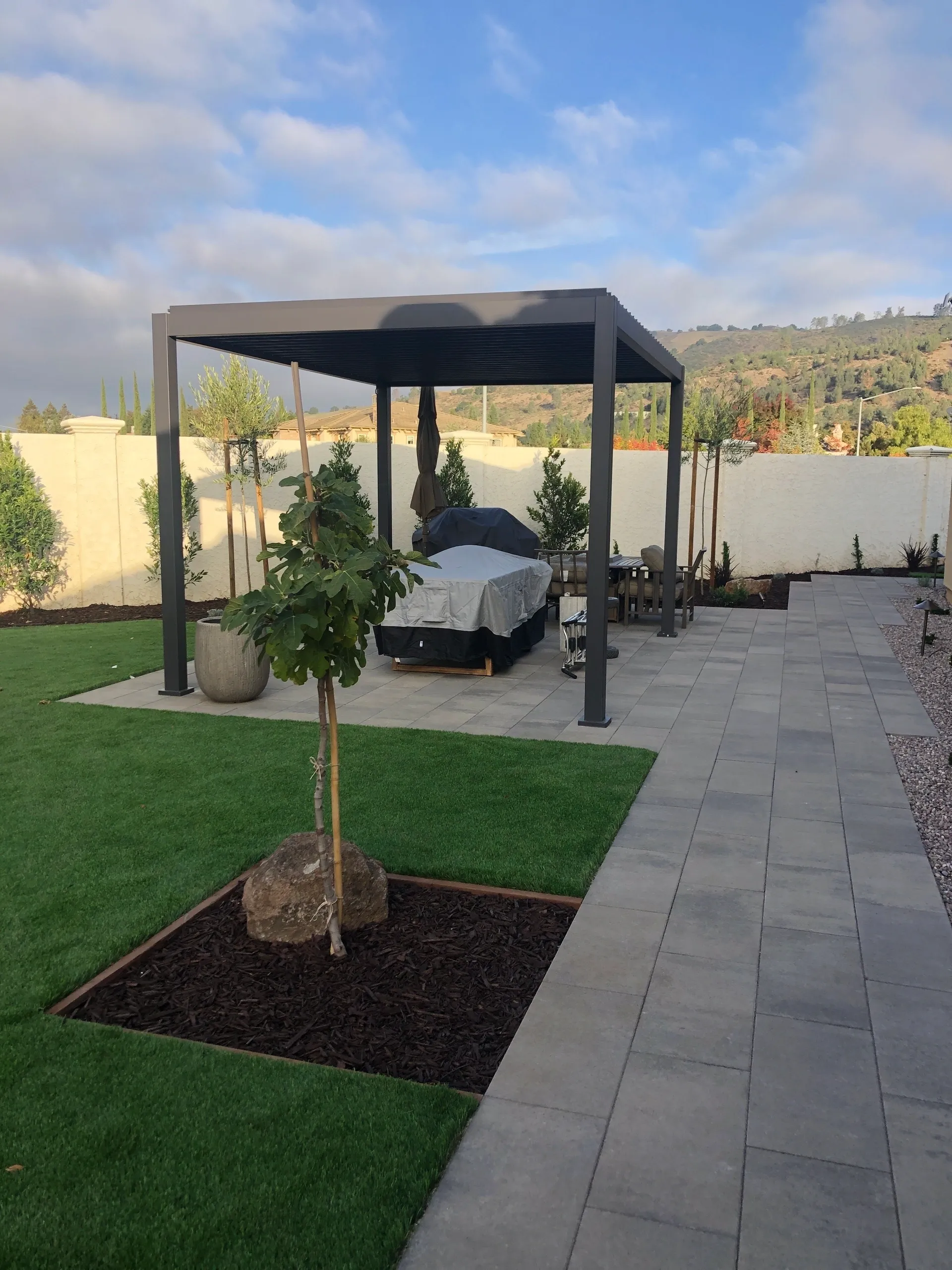 Elegant garden patio with tiled pathway